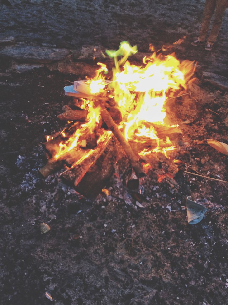 burning, flame, fire - natural phenomenon, heat - temperature, bonfire, firewood, glowing, fire, high angle view, close-up, orange color, night, heat, wood - material, motion, campfire, no people, outdoors, yellow, nature