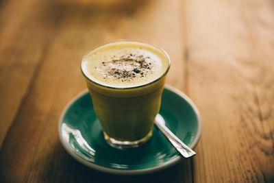 Close-up of coffee cup on table