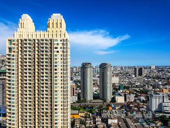 Modern buildings against blue sky