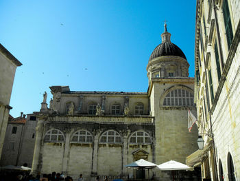 Low angle view of cathedral against clear blue sky