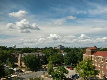 View of buildings against cloudy sky