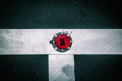 High angle view of red bicycle on road