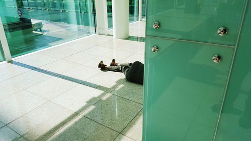 Low section of people lying on floor