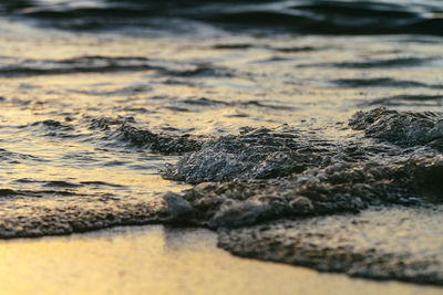 Close-up of wave on beach