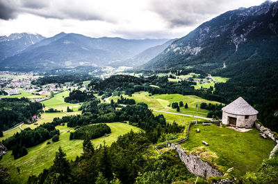 Scenic view of landscape and mountains against sky