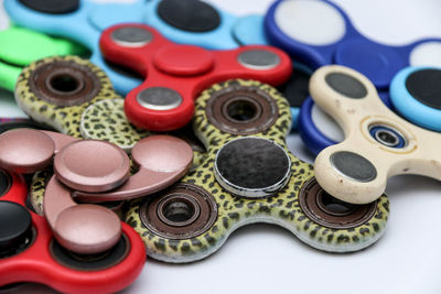 Close-up of fidget spinners on white background