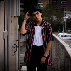 Portrait of young man standing outdoors