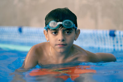 Portrait of boy in a swimming pool