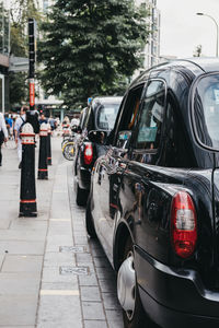 Taxis on street in city