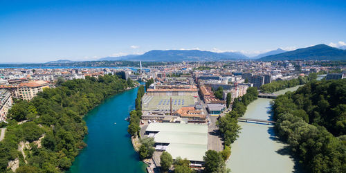 High angle view of river amidst buildings in city