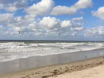 Scenic view of beach against sky