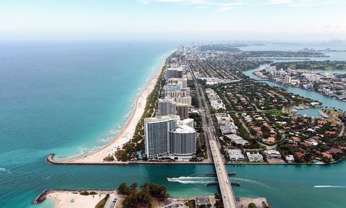 High angle view of cityscape by sea