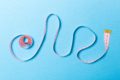 High angle view of blue paint on white background