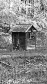 Hut on grassy field