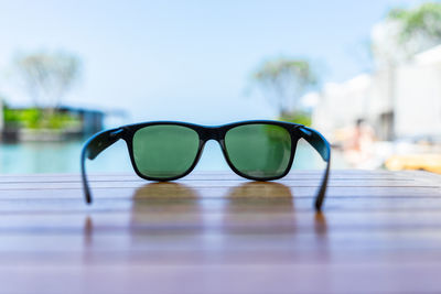 Close-up of sunglasses on table