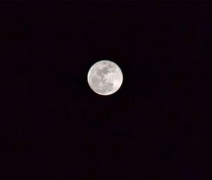 Low angle view of moon against sky at night