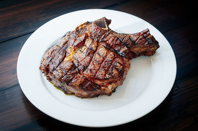 High angle view of meat in plate on table