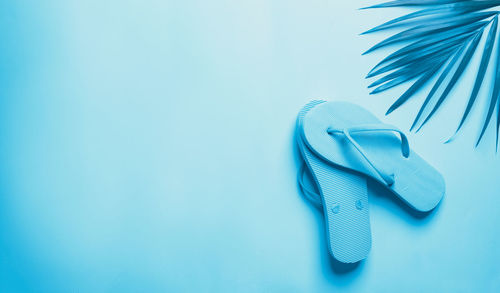 Close-up of shoes over white background