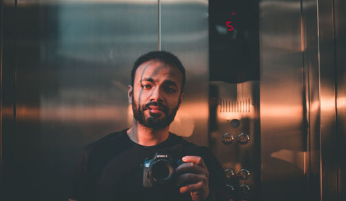 Close-up of man photographing