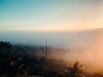 Scenic view of mountains against sky during sunset