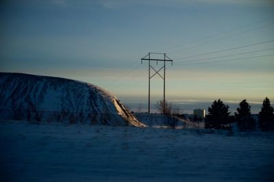 Scenic view of mountains against sky during winter