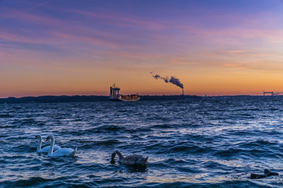 Scenic view of sea against sky during sunset