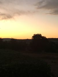 Scenic view of silhouette landscape against sky during sunset