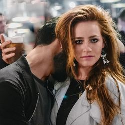 Close-up of young woman using mobile phone