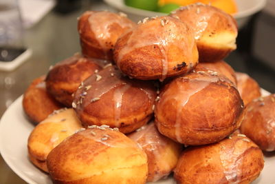 Close-up of baked donuts in plate