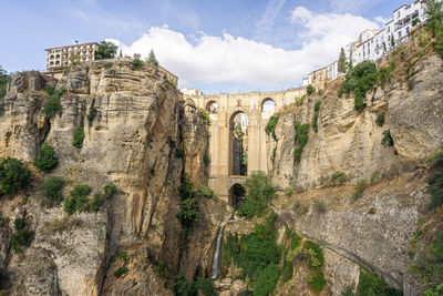 Panoramic view of rock formations against sky