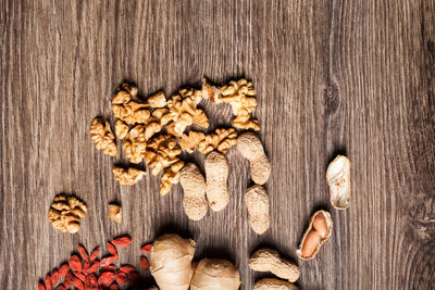 Directly above shot of pine cone on wooden table