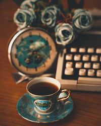 High angle view of coffee cup on table