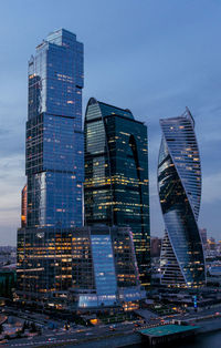 Modern buildings in city at dusk
