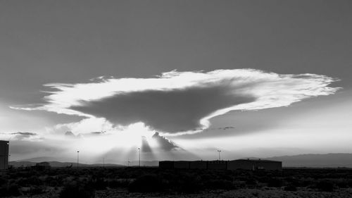 Smoke stacks against sky