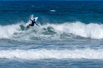 Man surfing in sea