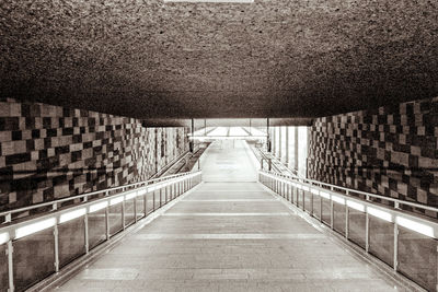 Empty footbridge in tunnel