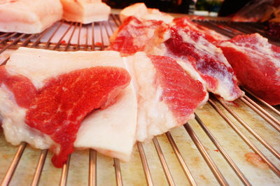 Close-up of meat on barbecue grill