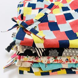 Close-up of stacked aprons