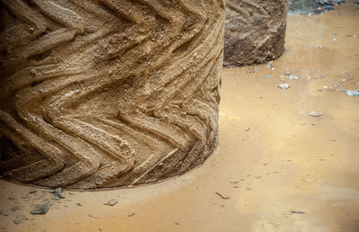 High angle view of statue on sand