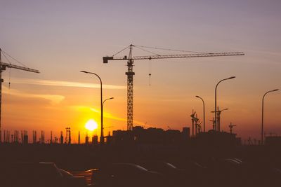 Traffic on road with construction site in background