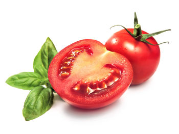 Close-up of strawberry over white background