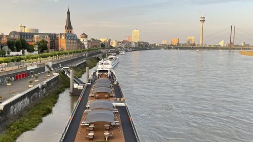 View of bridge over river with city in background