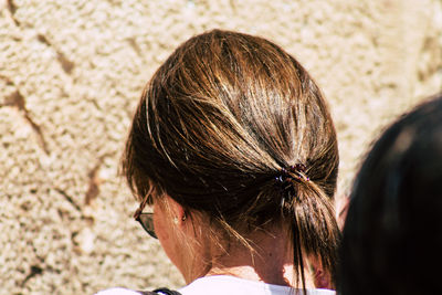 Close-up rear view of woman