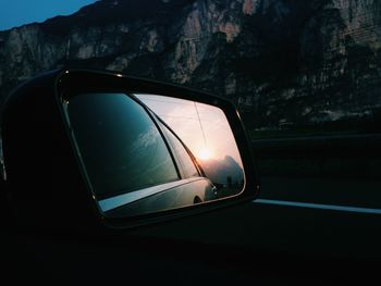 Close-up of car on side-view mirror