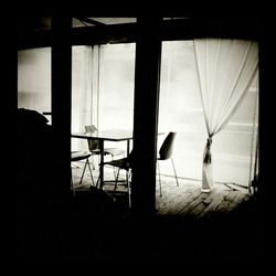 Empty chairs and window