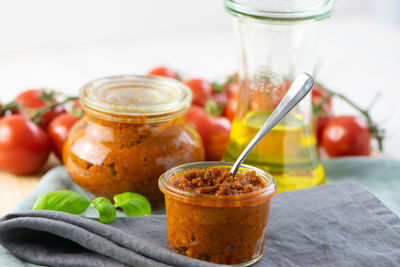 Close-up of juice in glass jar on table