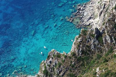 High angle view of rock formation at beach