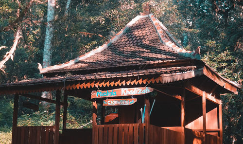 View of temple hanging from roof of building