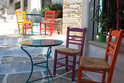 Empty chairs and table in cafe