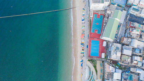 High angle view of swimming pool by building